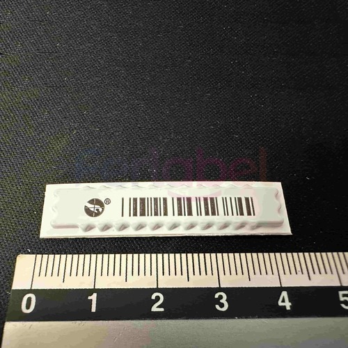 etichette-miniultra-strip-ii-sensormatic-on-sheet-barcode-conf-5000-et-dot-zlaps2